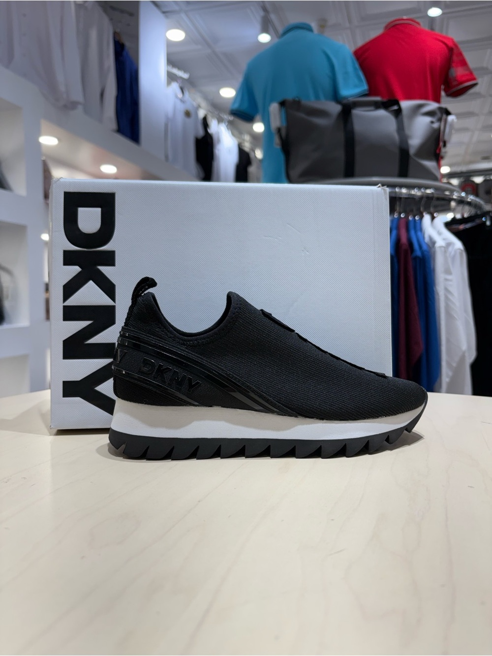 DKNY Men’s Black Slip-On Sneaker with White Midsole